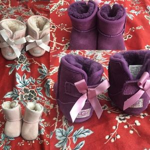 2 pair of baby UGG size 2/3 purple and pink